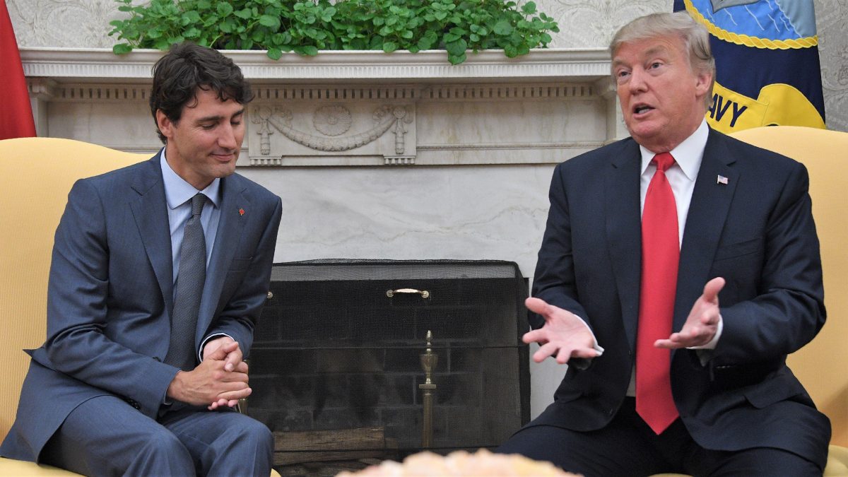 US President Donald Trump (R) speaks during a meeting with Canadian Prime Minister Justin Trudeau in the Oval Office at the White House in Washington, DC, on October 11, 2017 / AFP PHOTO / JIM WATSON (Photo credit should read JIM WATSON/AFP/Getty Images)