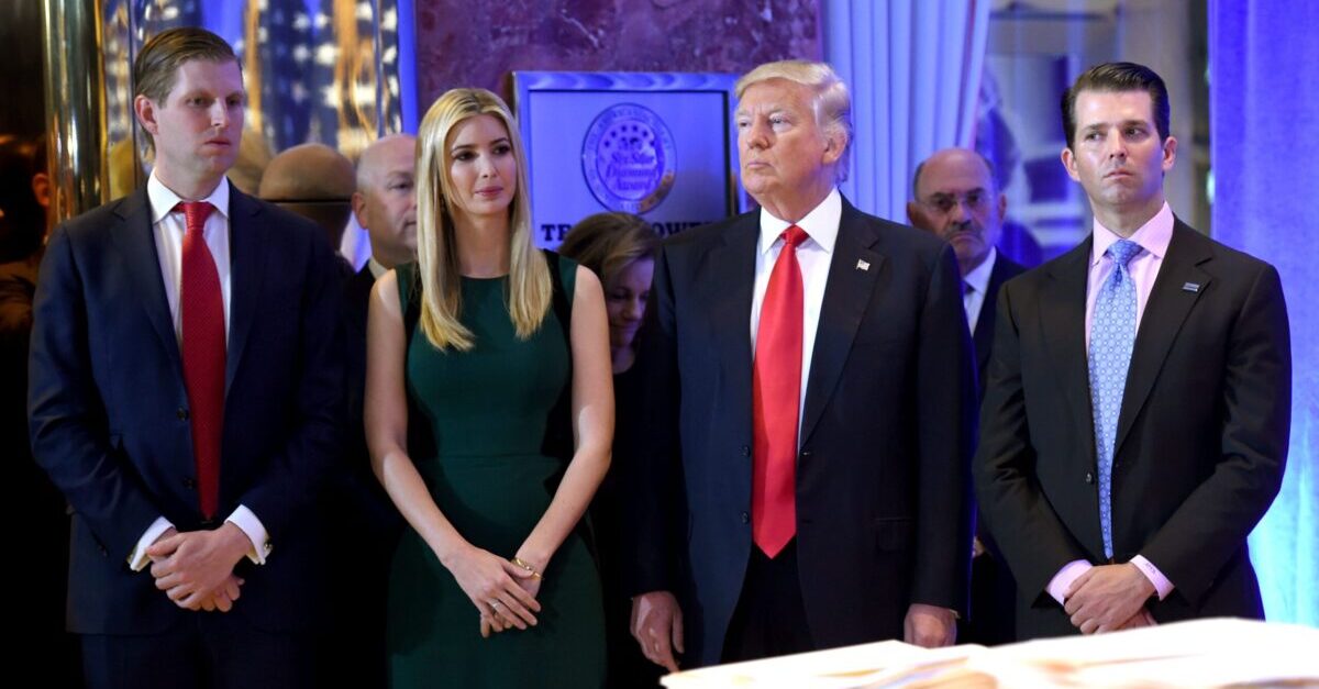 US President-elect Donald Trump along with his children Eric(L) Ivanka and Donald Jr. arrive for a press conference January 11, 2017 at Trump Tower in New York. Trump held his first news conference in nearly six months Wednesday, amid explosive allegations over his ties to Russia, a little more than a week before his inauguration. / AFP / Timothy A. CLARY