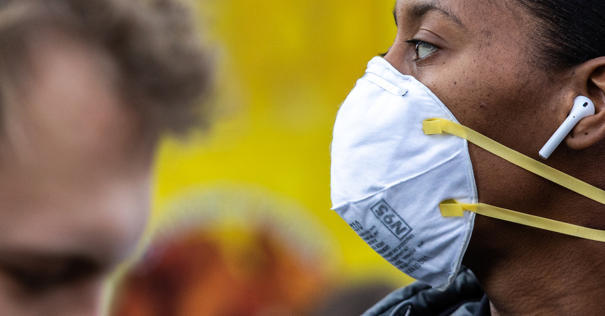NEW YORK, NY - MARCH 09: A woman wearing a protective mask is seen in Union Square on March 9, 2020 in New York City. There are now 20 confirmed coronavirus cases in the city including a 7-year-old girl in the Bronx.