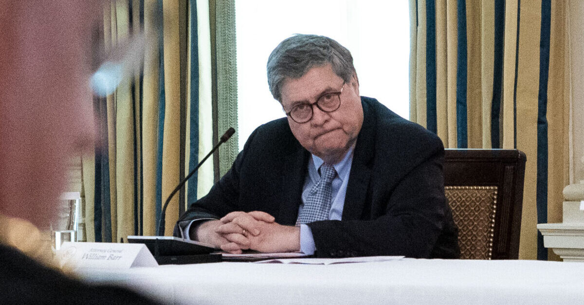 WASHINGTON, DC - JUNE 08: Attorney General William Barr looks on as U.S. President Donald Trump makes remarks as he participates in a roundtable with law enforcement officials in the State Dining Room of the White House, June, 8, 2020 in Washington, DC. 