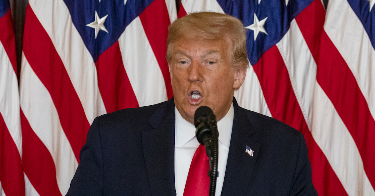 WASHINGTON, DC - July 24: President Donald Trump speaks as he presents the Presidential Medal of Freedom to Olympic track and field athlete and former member of the U.S. House of Representatives Jim Ryun in the Blue Room of the White House on July 24, 2020 in Washington, D.C. Ryun, a former Kansas congressman, was the first high school runner to run a mile in under four minutes. He competed in three Olympic Games and won a silver medal in 1968 Summer Olympics in Mexico City. 