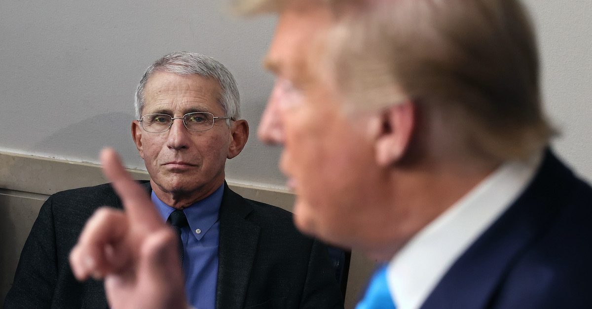 WASHINGTON, DC - APRIL 07: Anthony Fauci, director of the National Institute of Allergy and Infectious Diseases, listens to U.S. President Donald Trump speak to reporters following a meeting of the coronavirus task force in the Brady Press Briefing Room at the White House on April 7, 2020 in Washington, DC. The president today removed the independent chairman of a committee tasked with overseeing the roll out of the $2 trillion coronavirus bailout package. (Photo by Chip Somodevilla/Getty Images)