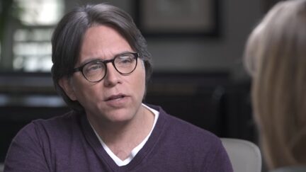 NXIVM's Keith Raniere appears in a video.