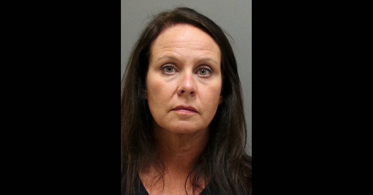 Carrie Witt appears in a mugshot