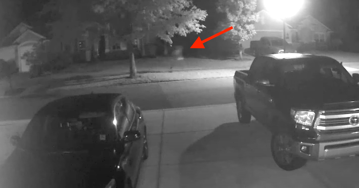 A still frame captured from a neighborhood surveillance camera shows what prosecutors and law enforcement authorities believe to be alleged murderer Aiden Fucci running from the location where he killed Tristyn Bailey.