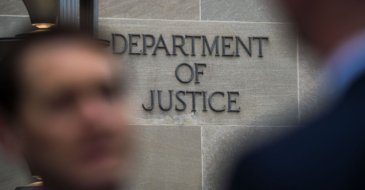 Department of Justice" sign is seen on the wall of the US Department of Justice building in Washington