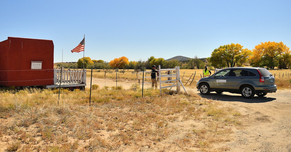 A vehicle from the Office of the Medical Investigator enters the front gate leading to the Bonanza Creek Ranch on October 22, 2021 in Santa Fe, New Mexico. (Photo by Sam Wasson/Getty Images)