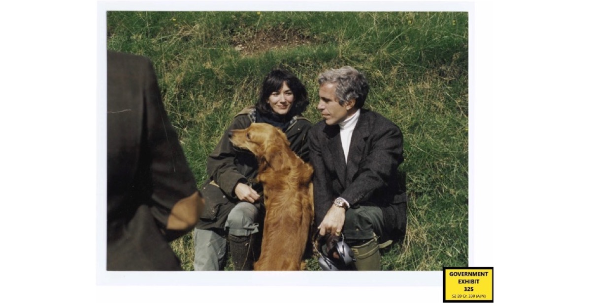 Ghislaine Maxwell and Jeffrey Epstein are photographed with a dog