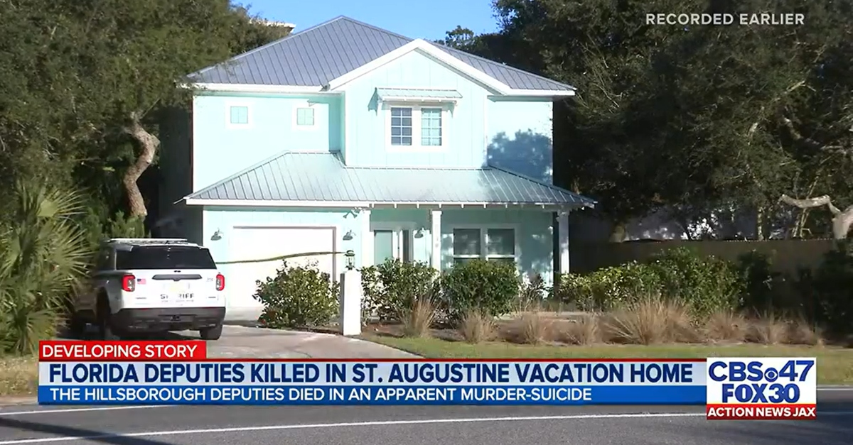 A light blue, two-story home where a sheriff's detective allegedly killed his romantic partner and died by suicide.