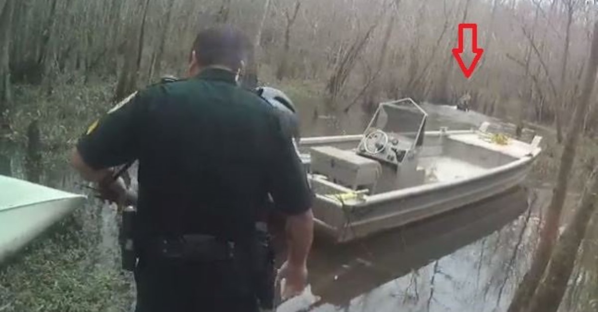 Dusty Mobley was caught on camera fleeing through a swamp. (Image via the Okaloosa County Sheriff's Office.)
