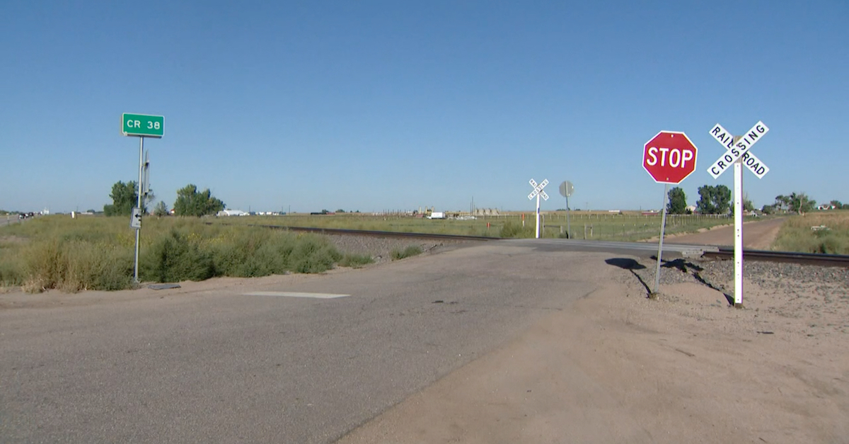 A photo shows a Platteville, Colorado crossing.