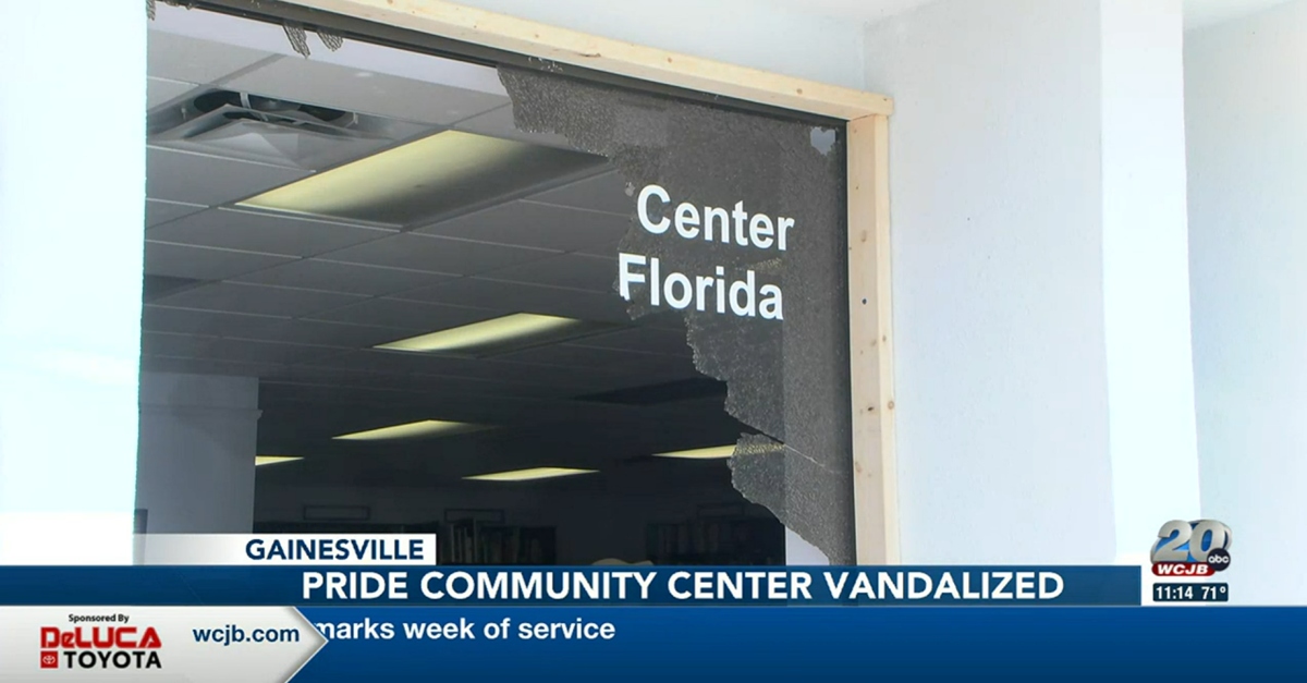 Vandalized window at Pride Community Center of North Central Florida