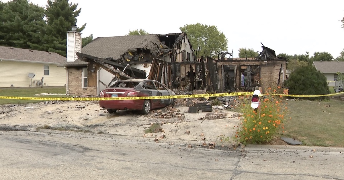 Susanne Tomlinson's home following the deadly fire allegedly set by Michael E. Sloan Jr.
