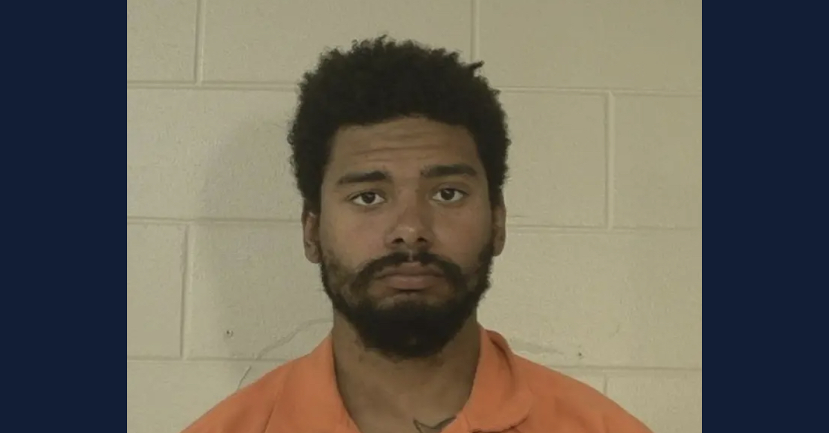 Byron Booker appears in a mugshot