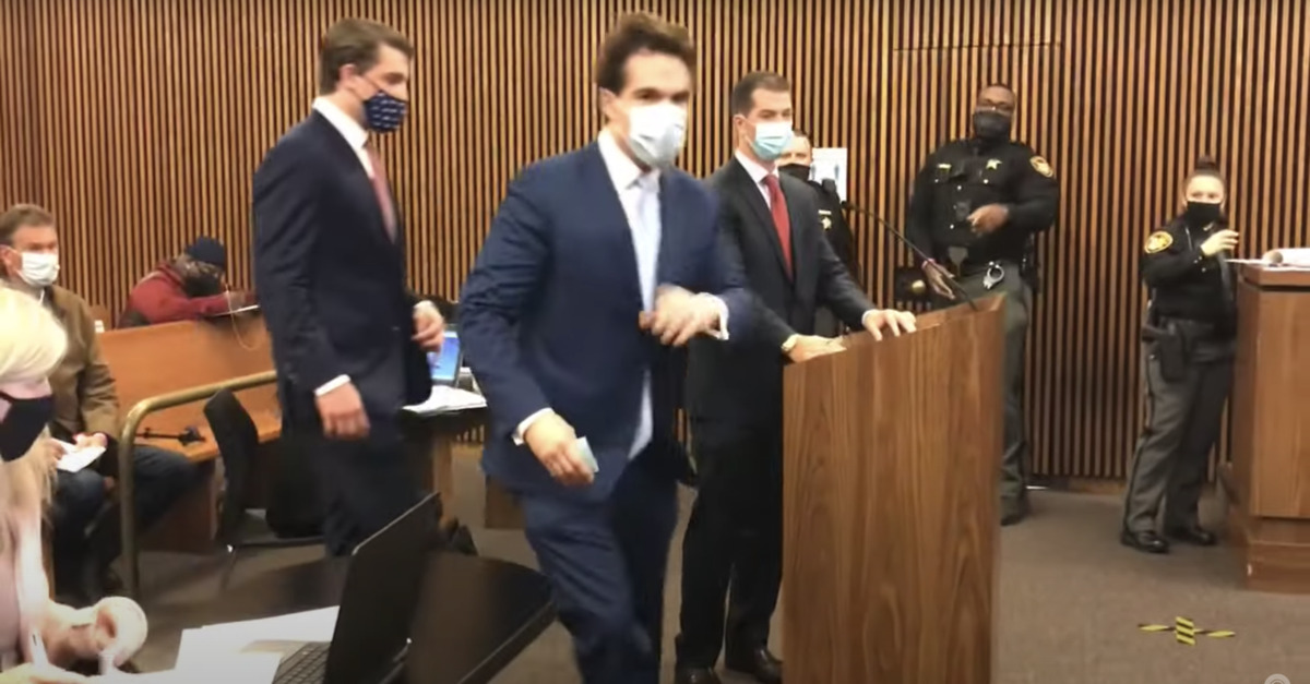 Jacob Wohl (L) and Jack Burkman (R) appear in court