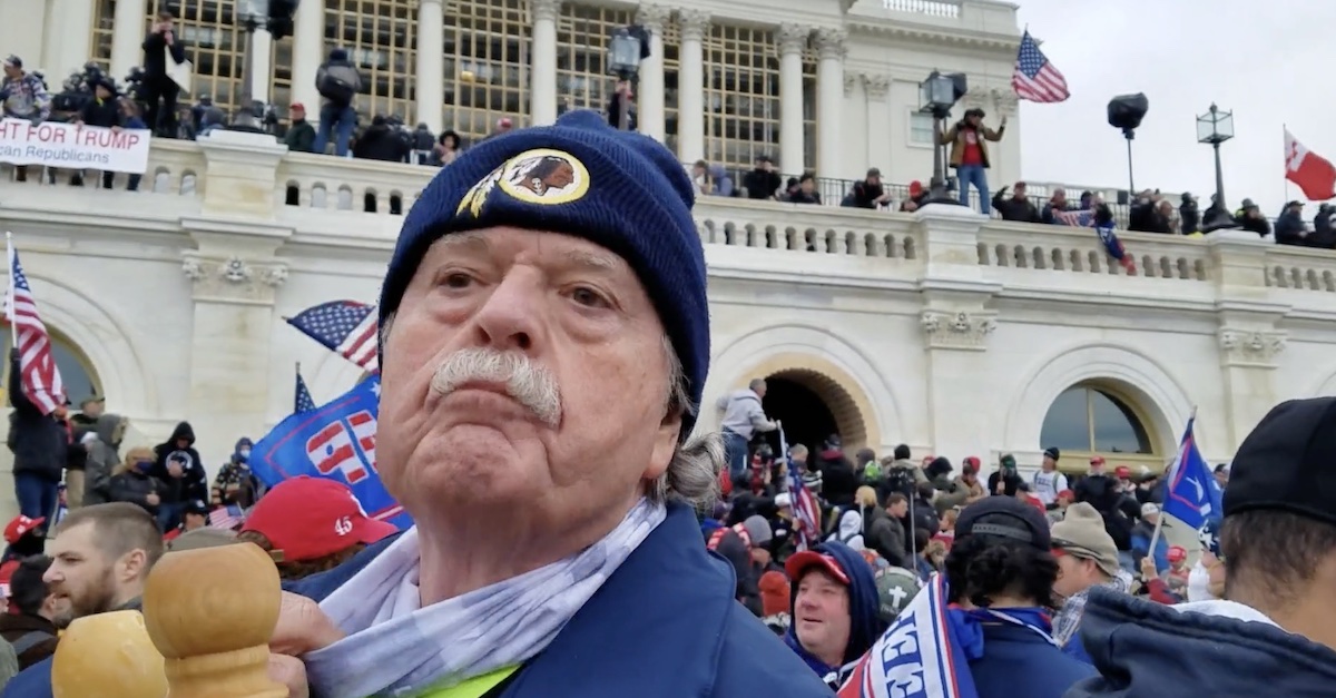 Thomas Caldwell is seen wearing a blue hat outside the Capitol on Jan. 6. Image via screengrab of government trial exhibit.