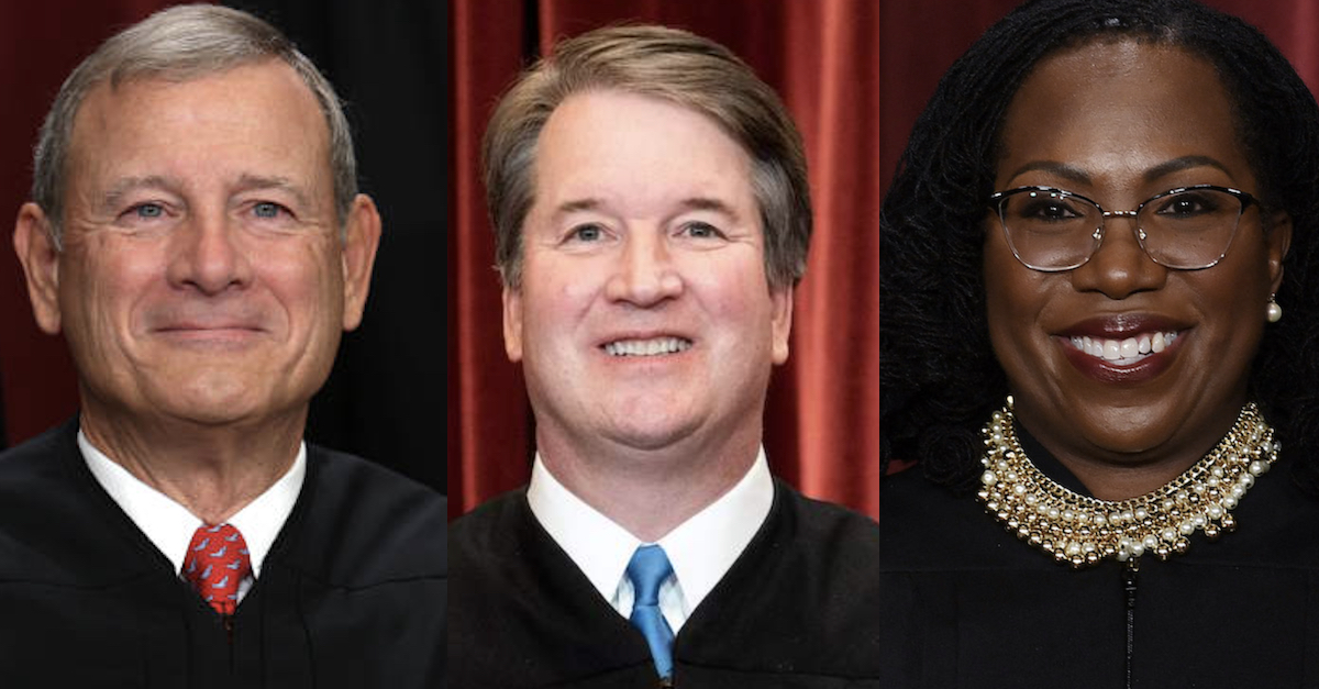 Chief Justice John Roberts (L) Justice Brett Kavanaugh (C) and Justice Ketanji Brown Jackson (L)