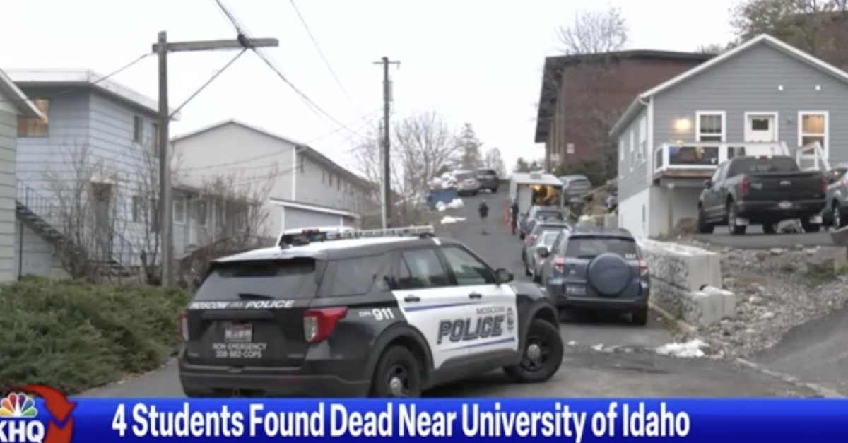 Police outside of the home where four University of Idaho students were found dead (KHQ-TV screenshot)