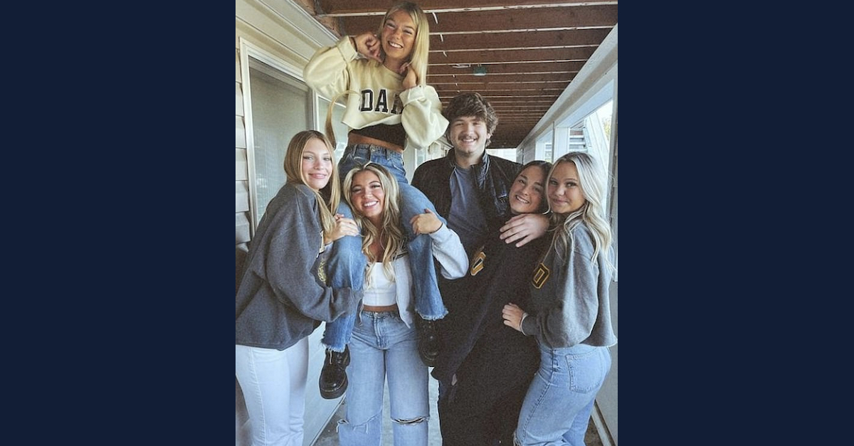 Dylan Mortensen (left) and Bethany Funke (right), and victims Kaylee Goncalves, Madison Mogen (on Kaylee's shoulders), Ethan Chapin and Xana Kernodle (hugging)