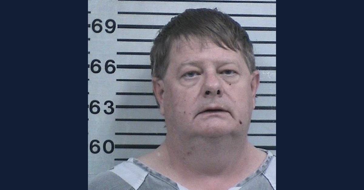 Jeffrey McLaughlin appears in a mugshot