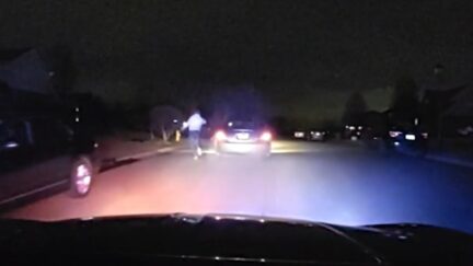 Suspect leaping out of a moving vehicle to flee Ohio troopers on foot on Jan. 20, 2023. (Image: Ohio State Highway Patrol)
