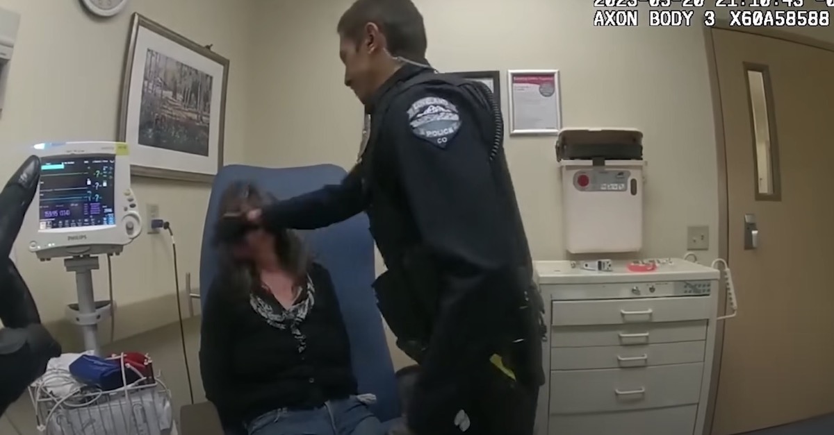 Officer Russell Maranto allegedly punching Angelia Hall (Loveland Police screenshot)
