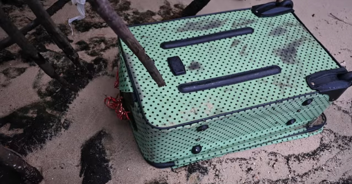Police released pictures of two of the three suitcases that contained a woman's remains. This one is "a green and black polka dot Charlie Sport bag." (Image Delray Beach Police Department)