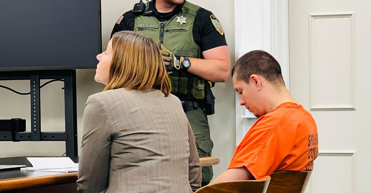 Majorjon Kaylor, 31, right, sits next to defense attorney Lisa Chesebro in a Wallace, Idaho, courtroom on Tuesday, June 20, 2023, during his first appearance on four murder charges. Prosecutors say Kaylor shot and killed his neighbors, including a child, Sunday evening. Idaho State Police have released few details, but said the shooting occurred after a "dispute between neighbors." (Josh McDonald/Shoshone News-Press via AP)