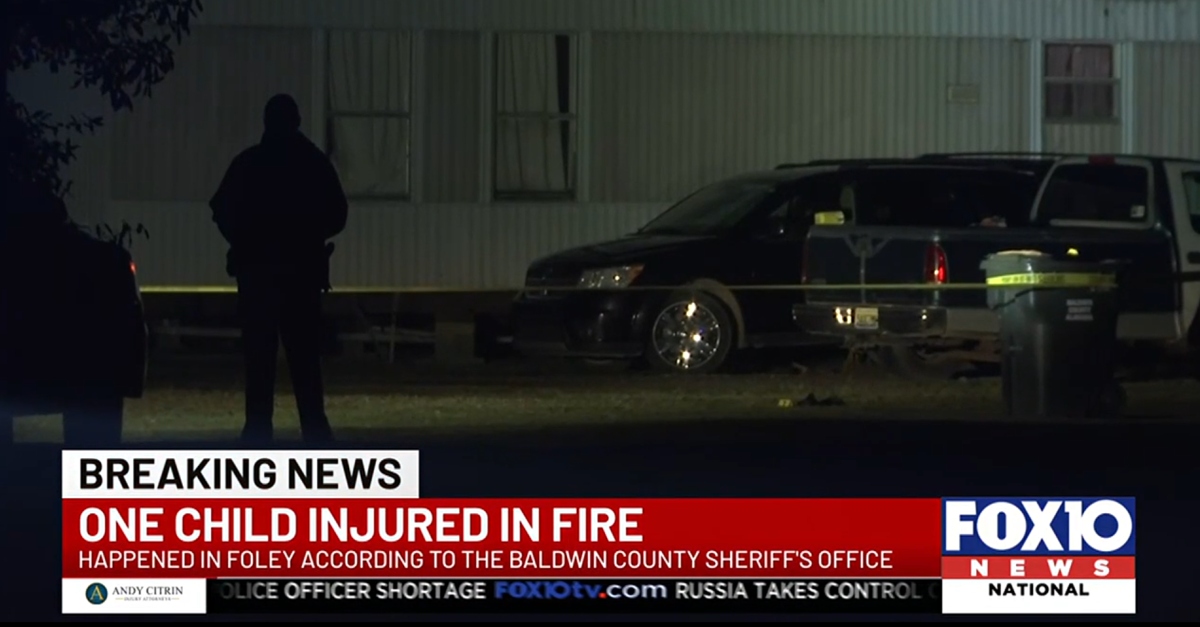 Deputies in Baldwin County, Alabama, respond to an incident, saying that a 17-year-old boy pushed a 6-year-old girl into a fire. (Screenshot: WALA)