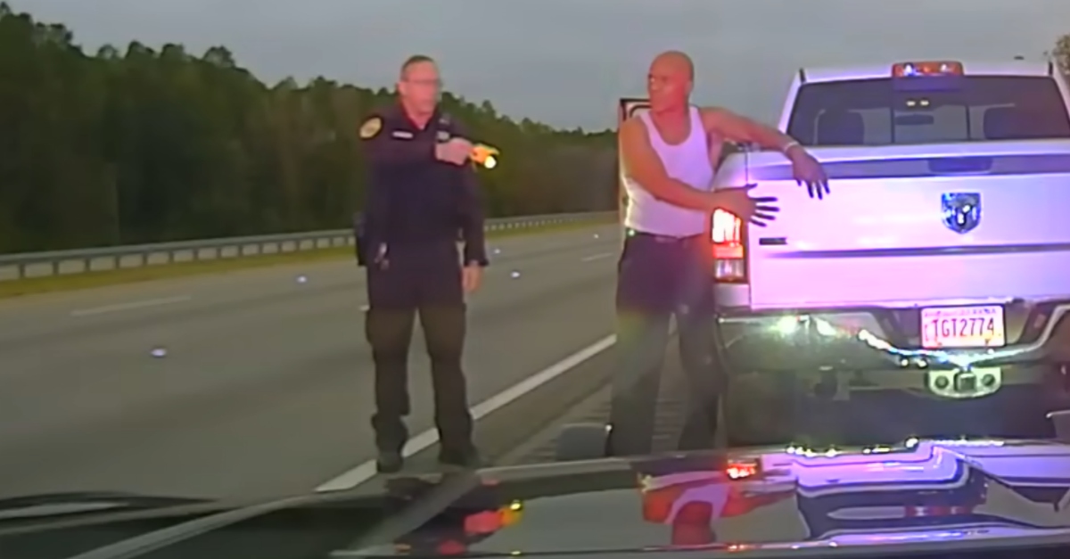 Camden County sheriff’s Staff Sgt. Buck Aldridge and Leonard Allen Cure are seen here on Oct. 19, 2023, during a tense traffic stop that escalated to Aldridge fatally shooting Cure. (Screenshot: Camden County Sheriff
