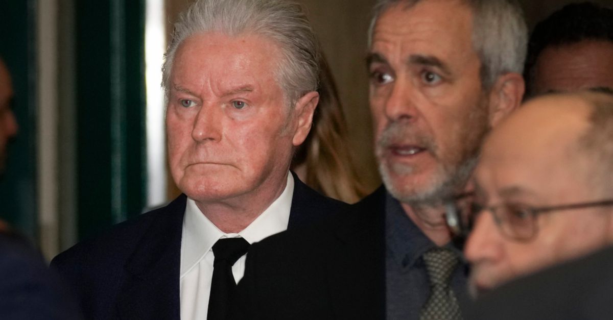 Musician Don Henley, left, arrives in court in New York on Wednesday, Feb. 28, 2024. Three collectibles-world professionals were on trial in the criminal case involving roughly 100 legal pad sheets from the development of the Eagles