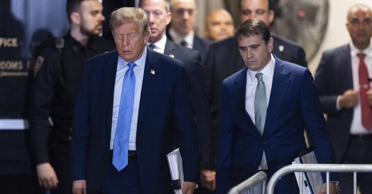 Former President Donald Trump arrives at Manhattan Criminal Court before his trial in New York.