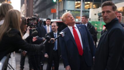 Former President Donald Trump speaks members of the media while visiting with construction workers at the construction site of the new JPMorgan Chase headquarters in midtown Manhattan, Thursday, April 25, 2024, in New York. Trump met with construction workers and union representatives hours before he's set to appear in court. (AP Photo/Yuki Iwamura)