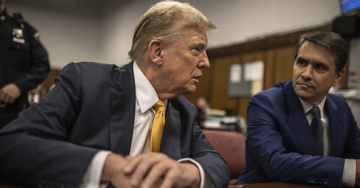 Former President Donald Trump sits in a courtroom next to his lawyer Todd Blanche before the start of the day's proceedings in the Manhattan Criminal court, Tuesday, May 21, 2024, in New York.