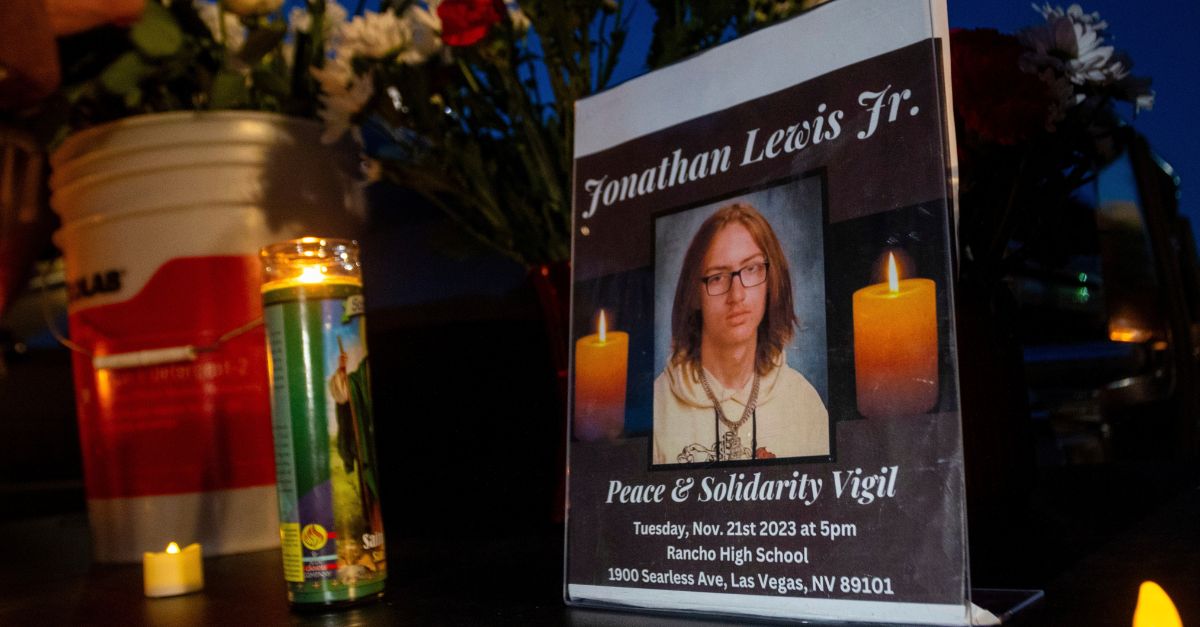 A memorial for Jonathan Lewis Jr. is set up in an alleyway near Rancho High School in eastern Las Vegas, Nov. 21, 2023 (AP Photo/Ty O'Neil).