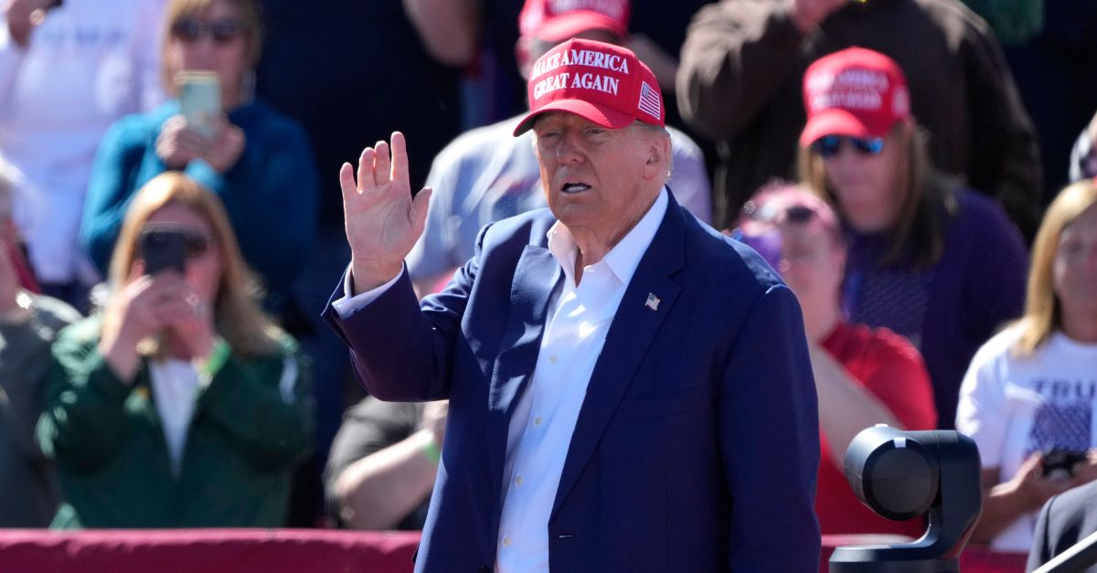 Republican presidential nominee former President Donald Trump waves as he departs a campaign event at Central Wisconsin Airport, Saturday, Sept. 7, 2024, in Mosinee, Wis. (AP Photo/Morry Gash)