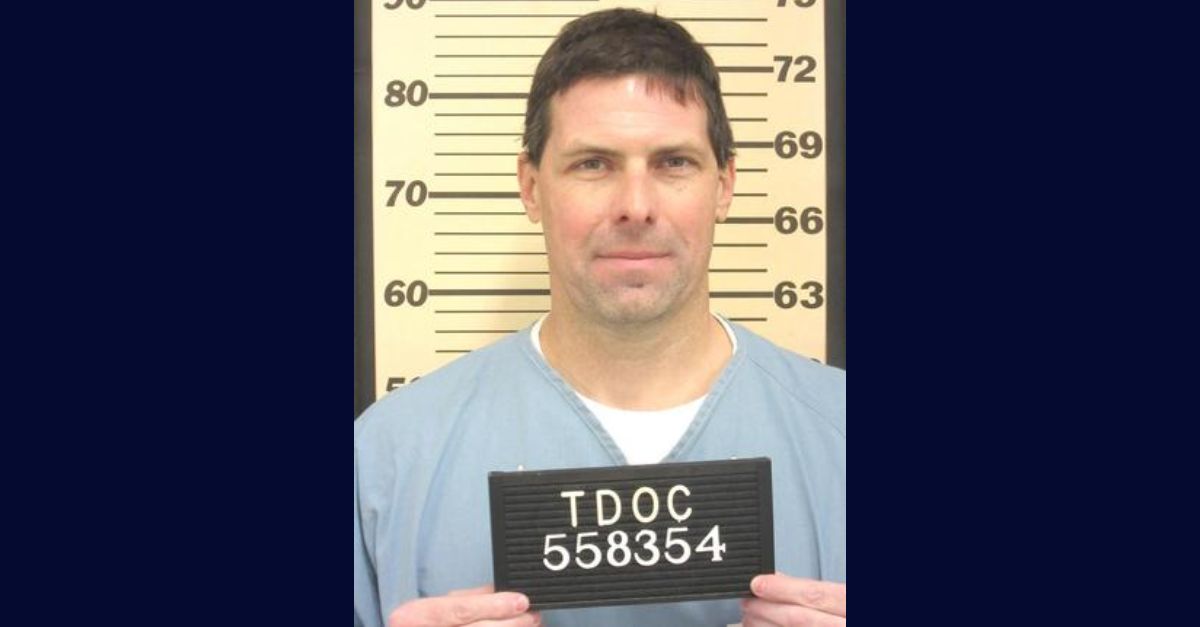 Fred Wortman appears in a booking photo.