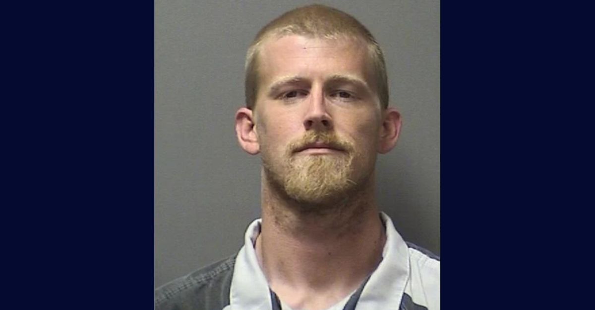 Amon Huntley appears in a booking photo.