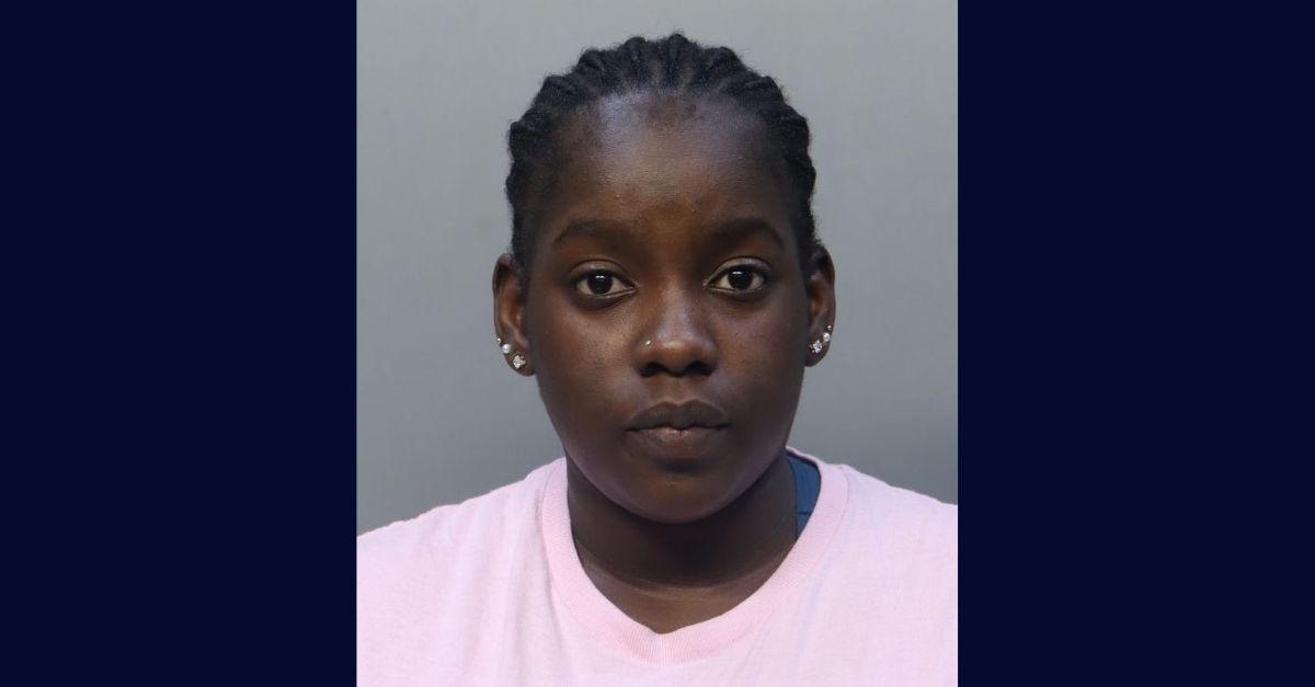 Kelly Michel appears in a booking photo.