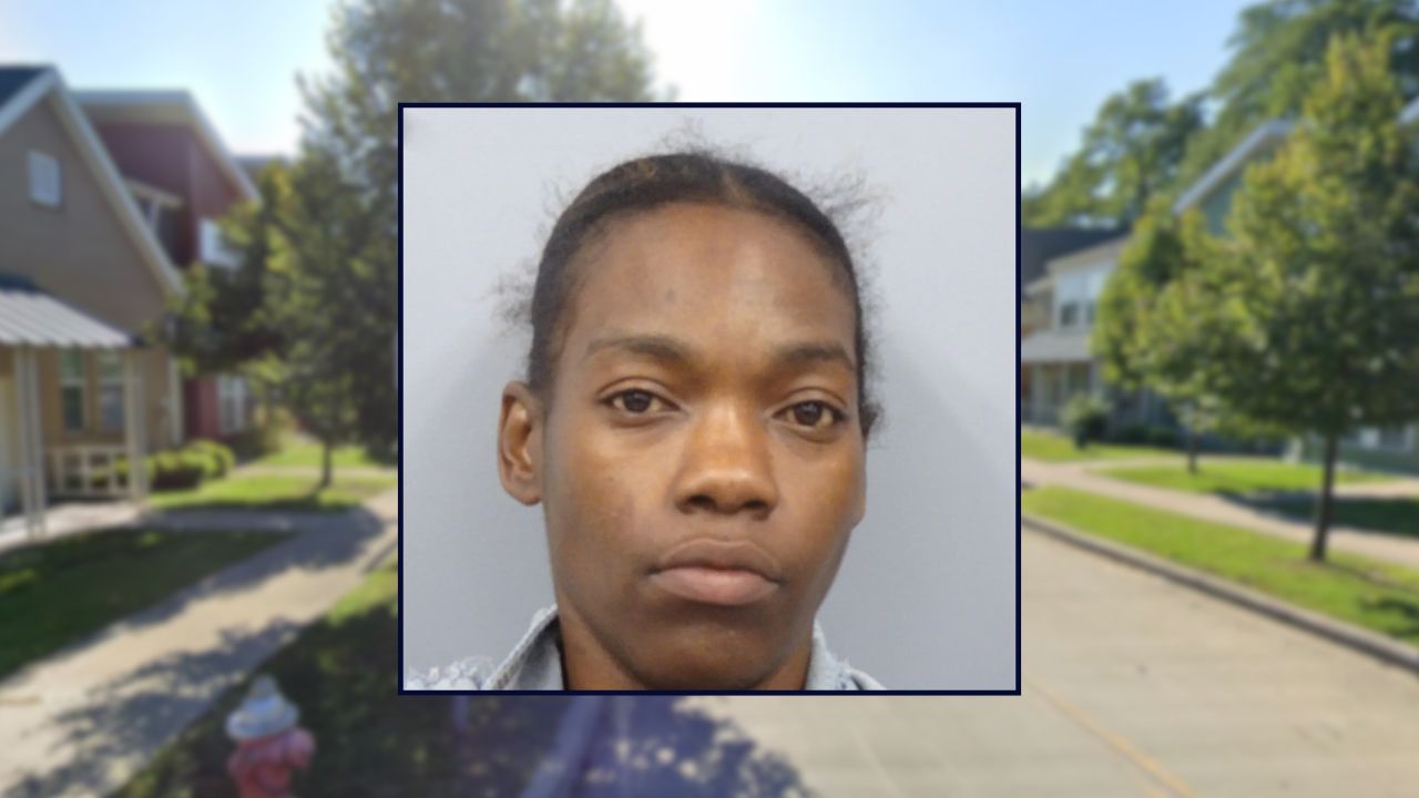 Niesha Walls appears in a booking photo inset against an image of a residential street in Cleveland.